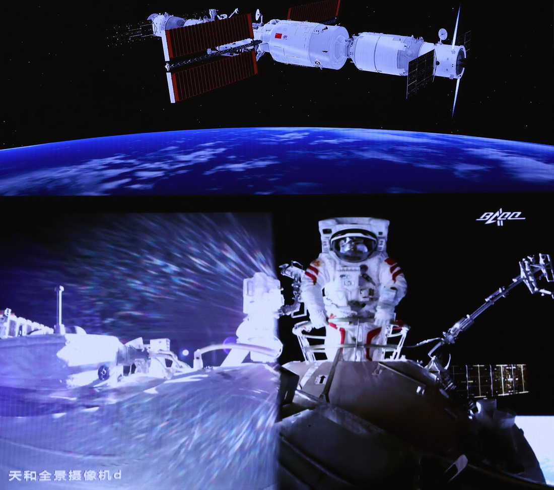 7月4日，在北京航天飞行控制中心大屏拍摄的航天员刘伯明在舱外工作场面。