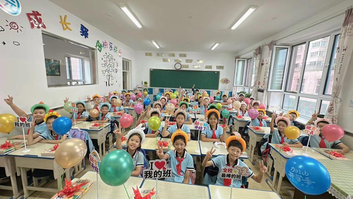 牡丹江长安小学校长图片