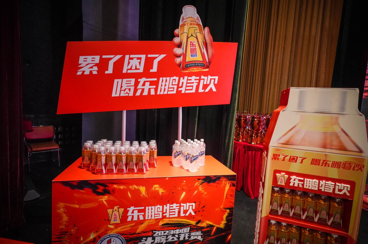 A display of drinks and a sign